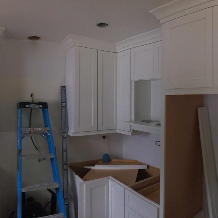 Kitchen remodel in progress: new cabinets installed, countertops not yet installed