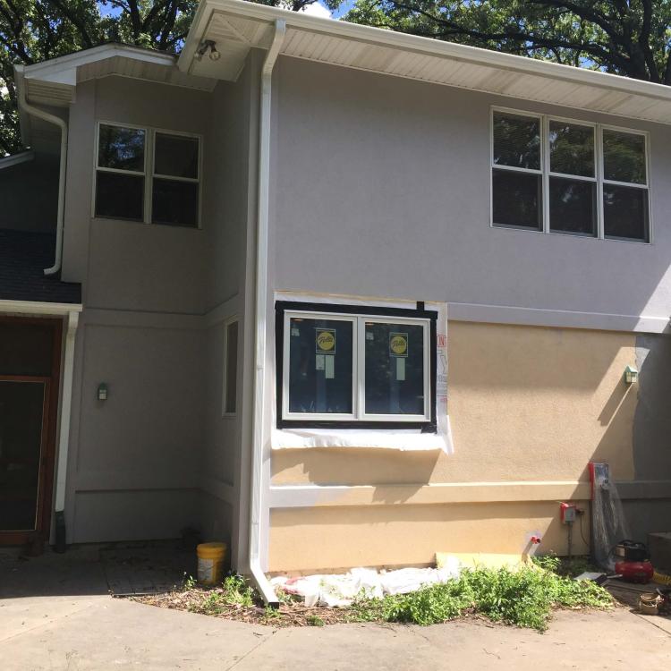 A house with a newly installed window.