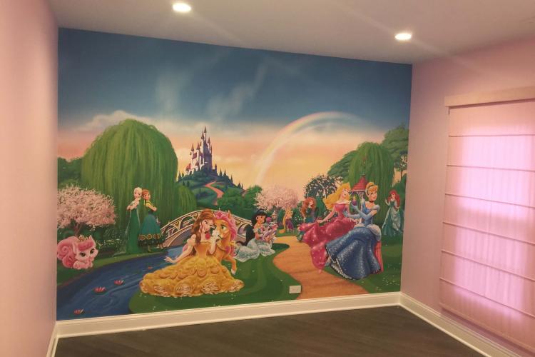 Child's bedroom with princess custom printed mural on the wall.