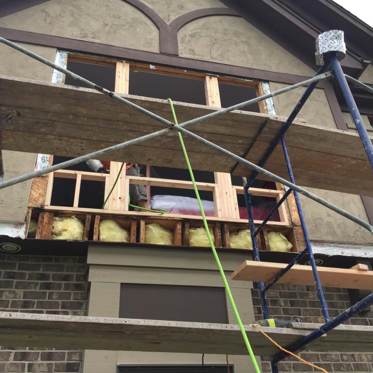 Window frame repair in progress - damaged window frame being repaired