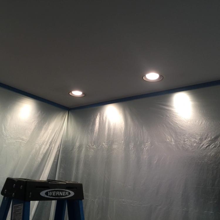 Interior painting preparation: room covered with plastic sheeting