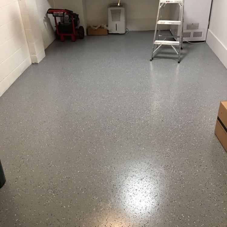 A finished epoxy garage floor.