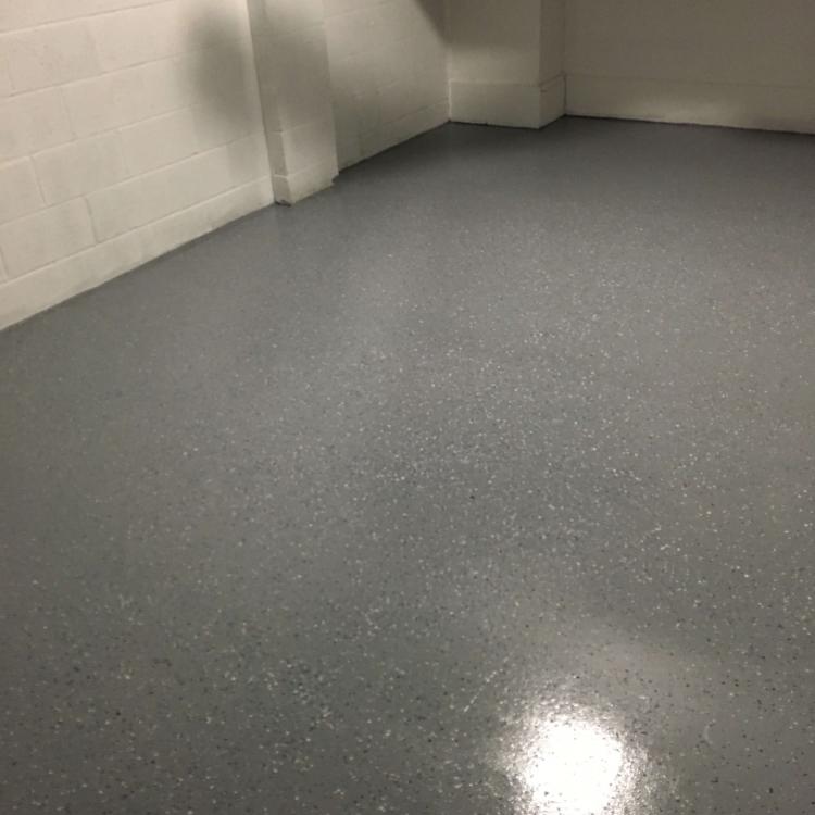 A durable epoxy floor coating in a garage.