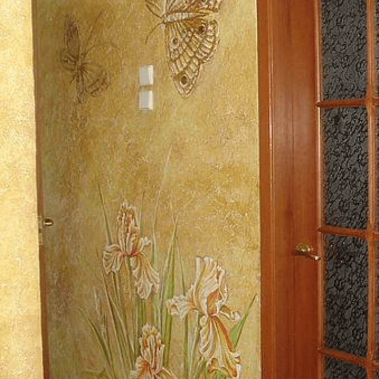 A wall mural featuring butterflies and irises, painted in a realistic style on a yellow background