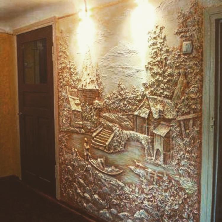 A 3D wall mural depicting a peaceful countryside scene with a river, a bridge, and a village.